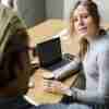 Woman Listening at Desk