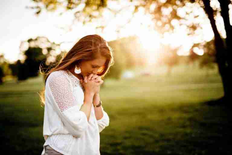 Prayer is The Answer-How Should We Pray-a woman with her hands together in front of her face