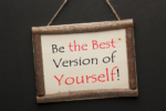 Be The Best Version of Yourself- a sign with a wooden frame on a string