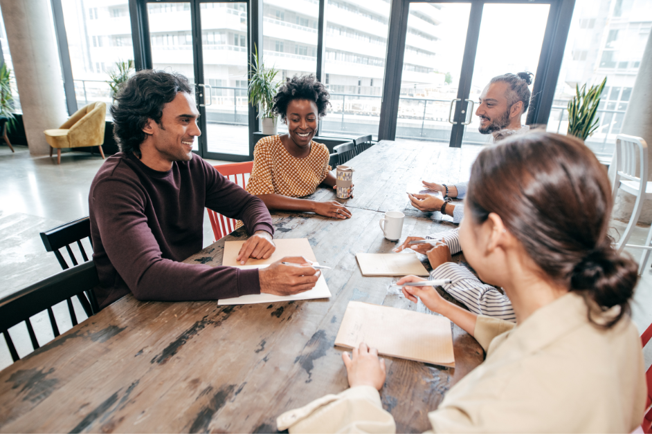 Healthy Relationships- a group of people sitting around a table